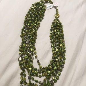 Green multi strand stone necklace